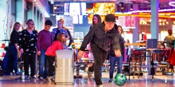 Strike Bowling Family having Fun