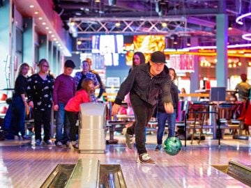 Strike Bowling Family having Fun