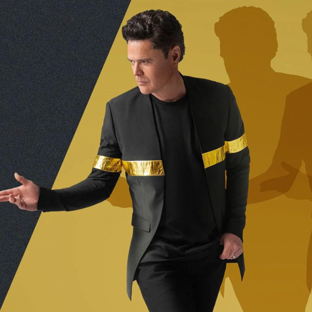 Donny Osmond in Black Suit and Gold Stripes promo image